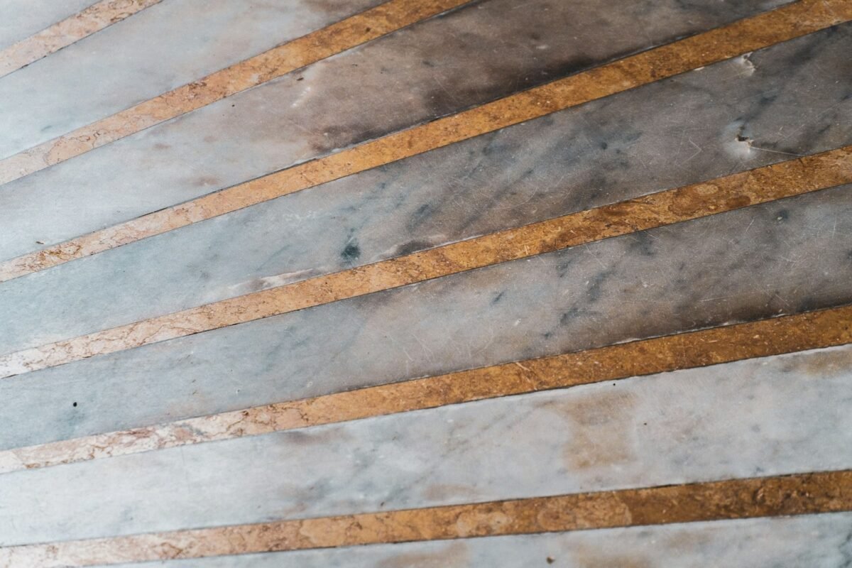 Light marble and dark stone pattern showcasing Manila FAME 2026 stone elegance